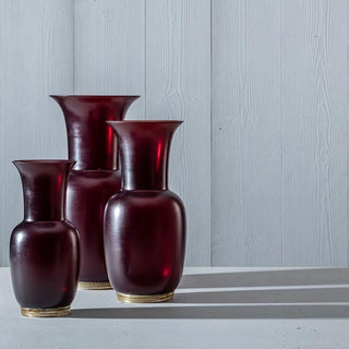 Venini Satin 706.22 satin vase ox blood red/crystal with gold leaf h. 36 cm. Buy now on Shopdecor